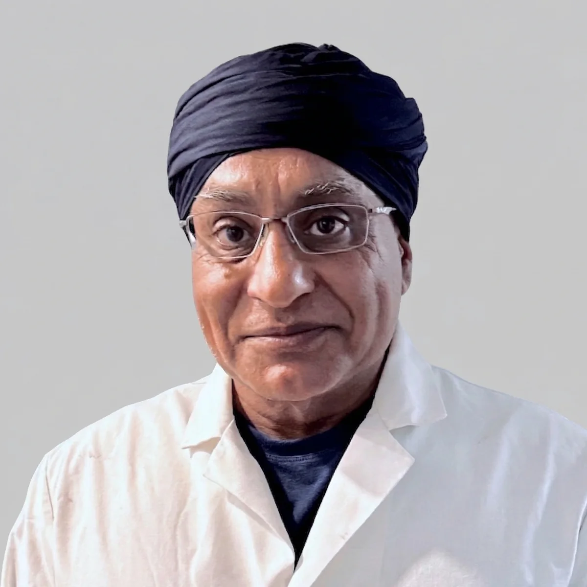 Portrait of Dr. Gurpreet Singh Padda, MD, MBA, MHP, founder and medical director of DWARAA